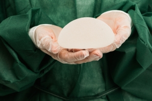 Removed breast implant during explant surgery in Turkey